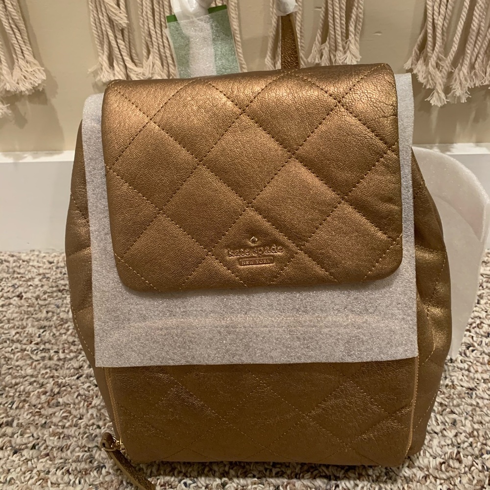 Kate Spade gold backpack NWT